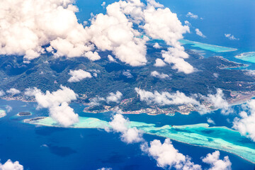 Bora Bora Island in Tahiti, French Polynesia. Travel, lifestyle, freedom and luxury concept. Aerial...
