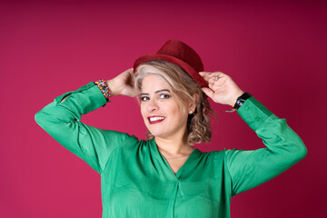 Woman in Green Shirt and Red Hat