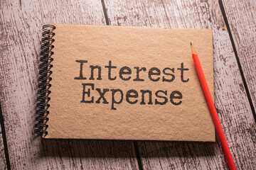 Business concept. notepad with the inscription - interest expense.