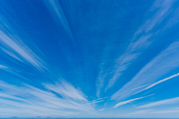 sky with cirrus clouds or clouds with fine filaments and radial composition - obrazy, fototapety, plakaty