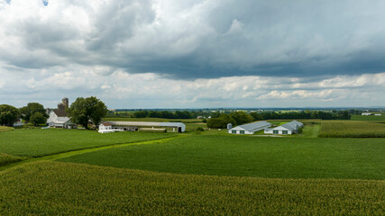 Fototapeta na wymiar Clouds Over a Quiet Farming Homestead