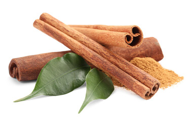 Dry aromatic cinnamon sticks, powder and green leaves isolated on white
