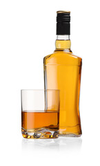 Glass and bottle of whiskey isolated on white