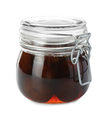 Jar of tasty sweet fig jam isolated on white