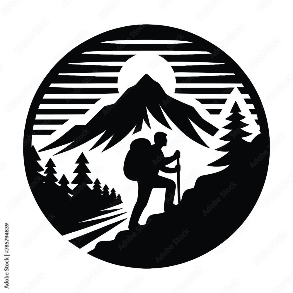 Wall mural silhouette of a lone hiker ascending a mountain trail against a sunset