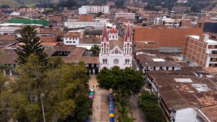 Fototapeta premium La Ceja, Antioquia - Colombia. March 9, 2024. Drone view of the basilica of Catholic worship