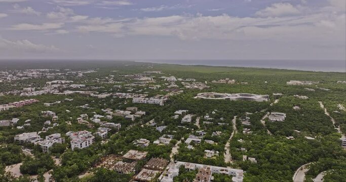 Tulum Mexico Aerial v6 high rising flyover luxury neighborhood capturing the panoramic views of new construction developments, town center and La Veleta - Shot with Mavic 3 Pro Cine - July 2023