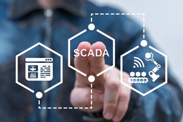 Operator using virtual screen presses text: SCADA. Supervisory Control And Data Acquisition ( SCADA...