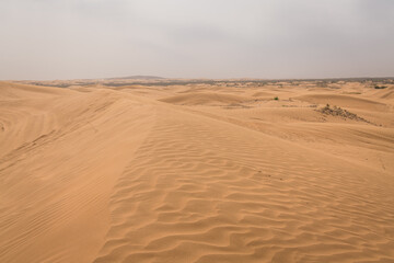 Fototapeta na wymiar Vast landscape of the Gobi desert in Chinese Inner Mongolia