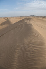 The background image of the sand texture created by the wind, erosion