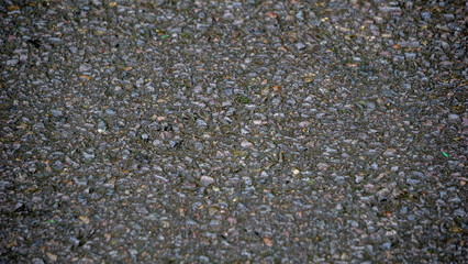 Close up black asphalt an cover