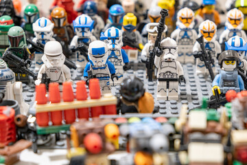 Fototapeta premium Prague, CZ -15.4.2024: army of LEGO soldiers equipped with Star War theme, guns creates an engaging play experience for kids, igniting their imagination and creativity. Editorial