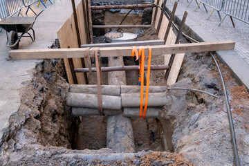 The street undergoes infrastructure maintenance, with a replacement of sewer and water systems....