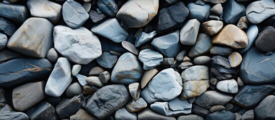 Background of pebble stones. Texture of stone wall background. - obrazy, fototapety, plakaty