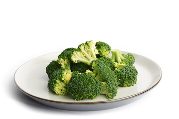 A heaping serving of broccoli on a plate isolated on white