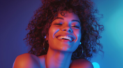 Curly-Haired Woman with Sparkling Makeup in Neon Light