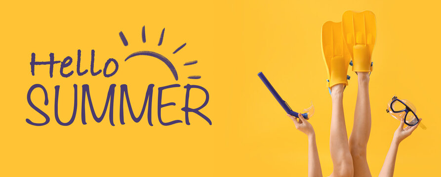 Young woman with flippers, snorkeling mask and tube on yellow background. Hello Summer - Powered by Adobe