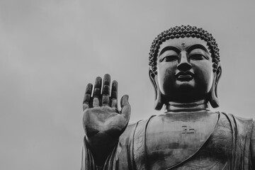 Majestic Buddha Statue Against Sky in Monochrome at Lantau Island
