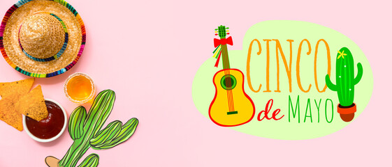 Shot of tequila, nachos and sombrero hat on pink background