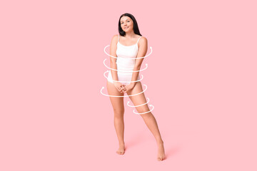 Body positive woman in underwear smiling on pink background