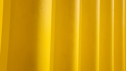 Yellow abstract vertical lines wall, modern design texture background