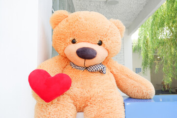 Teddy bear decoration on house,brown bear doll hanging at teddy home,Interior design,Template,copy space.