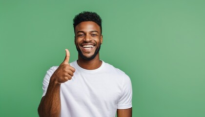 African American Male with Toothy Smile Pointing at Empty Space