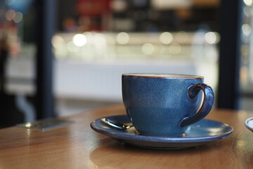 late coffee on cafe table at cafe background 