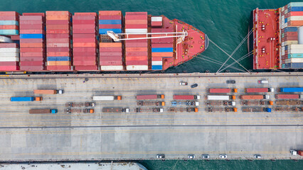 Cargo Container Ship with truck at commercial dock port. Shipyard Cargo Container Sea Port Freight forwarding service logistics and transportation. International Shipping Customs Port.