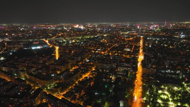 Aerial hyperlapse over Bulevardul Lacul Tei at night in Bucharest, Romania