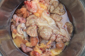 Fish eggs in aluminum containers on the table

