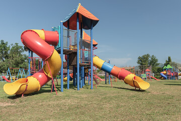 Playground in the park with blue sky - 785850676