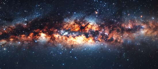 This image features a vast galaxy filled with numerous twinkling stars and a strikingly bright orange center - obrazy, fototapety, plakaty