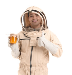 Male beekeeper with jar of honey showing thumb-up on white background