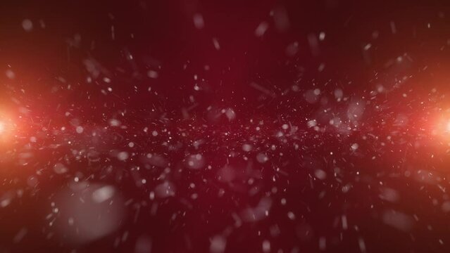 Abstract blurred flying particles loop motion on red copy space background.