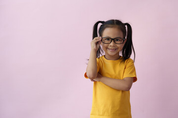 Portrait of a stylish little girl with fingers pointing up Little boy wearing glasses has an idea...