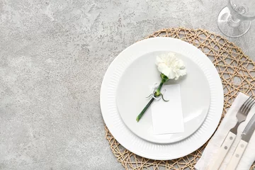 Fotobehang Table setting with beautiful flower on grey background © Pixel-Shot