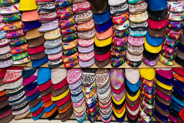 Stalls in Medina old town. Traditional shoes shop store. Fes, Morocco.