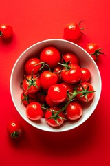 Fresh Cherry Tomatoes in a White Bowl on a Red Background