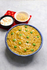 Healthy Quinoa dal khichdi. Made with quinoa, lentils, veggies, and spices, this quinoa dal khichdi is a one pot nutritious weight loss meal. Served with yougurt or curd. Copy Space