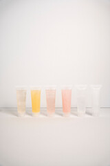 mockups for cosmetics colored liquid jars lip gloss cream gel shampoo 