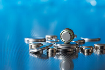 Group of flat lithium round button cell batteries