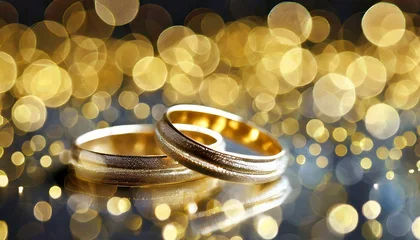 Fotobehang wedding symbols two golden weading rings © Viktorija