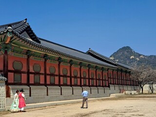 Traditional Korean palace in the downtown district Seoul and tourists