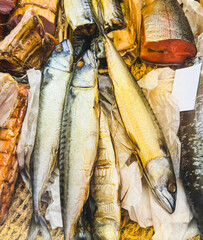 Smoked fish on a counter in a market