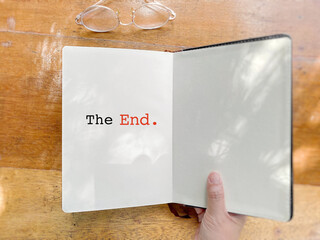 The end on last page of a book background. Stock photo.