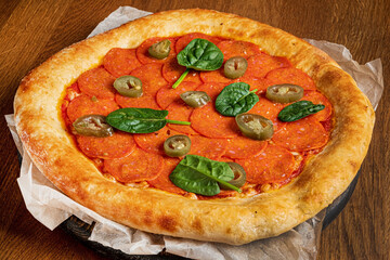 italian pizza on the wooden background