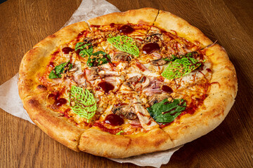 italian pizza on the wooden background