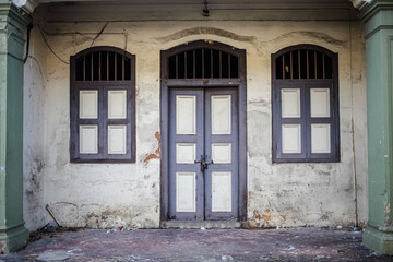 Old wall, windows and door vintage background. Classic concept. - Powered by Adobe