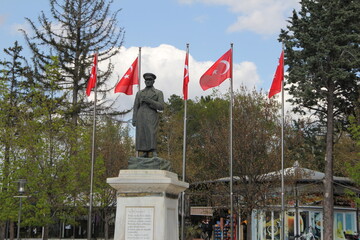 Ataturk bust and the Turkish flag behind it